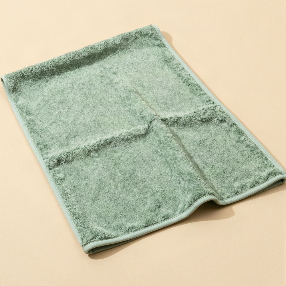 Illustration of the Quick-Dry Towel showing its hand pockets